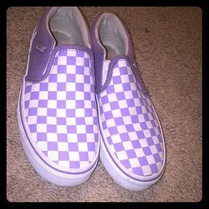 A used purple pair of Girly VANS.